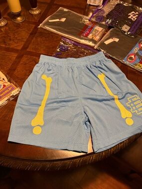 Eric Emanuel Light Blue Mesh Shorts with Yellow Label